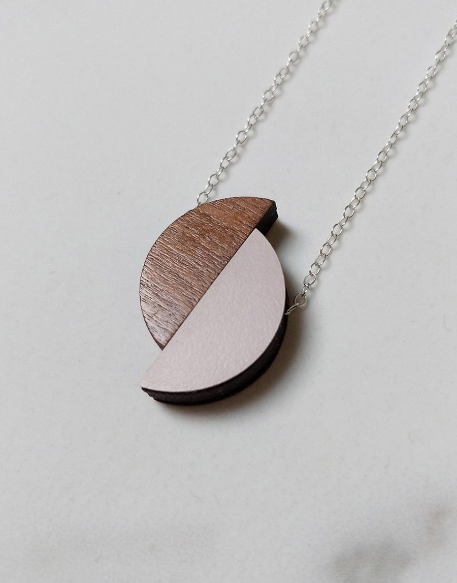 pink formica and walnut wood semi circle necklace close up 